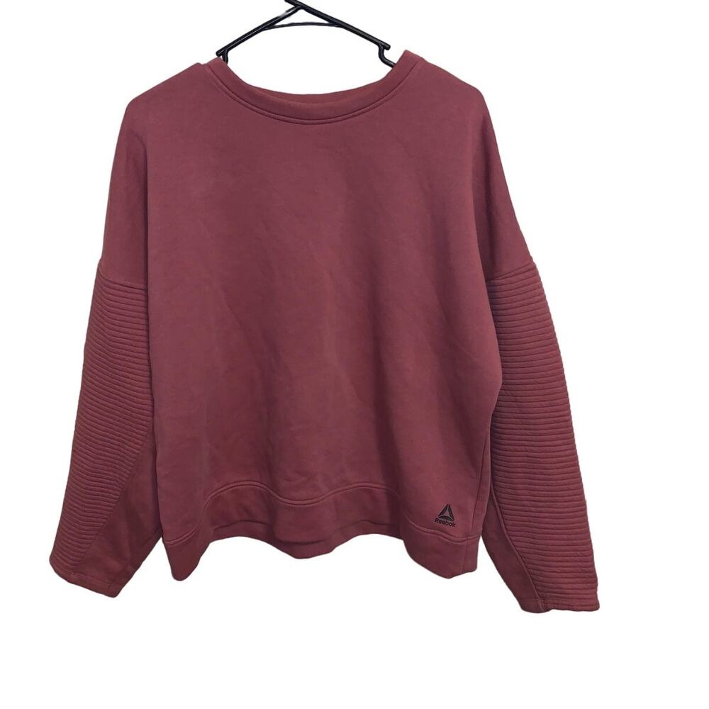 Reebok dusty pink crewneck sweatshirt no size compares to a large/XL